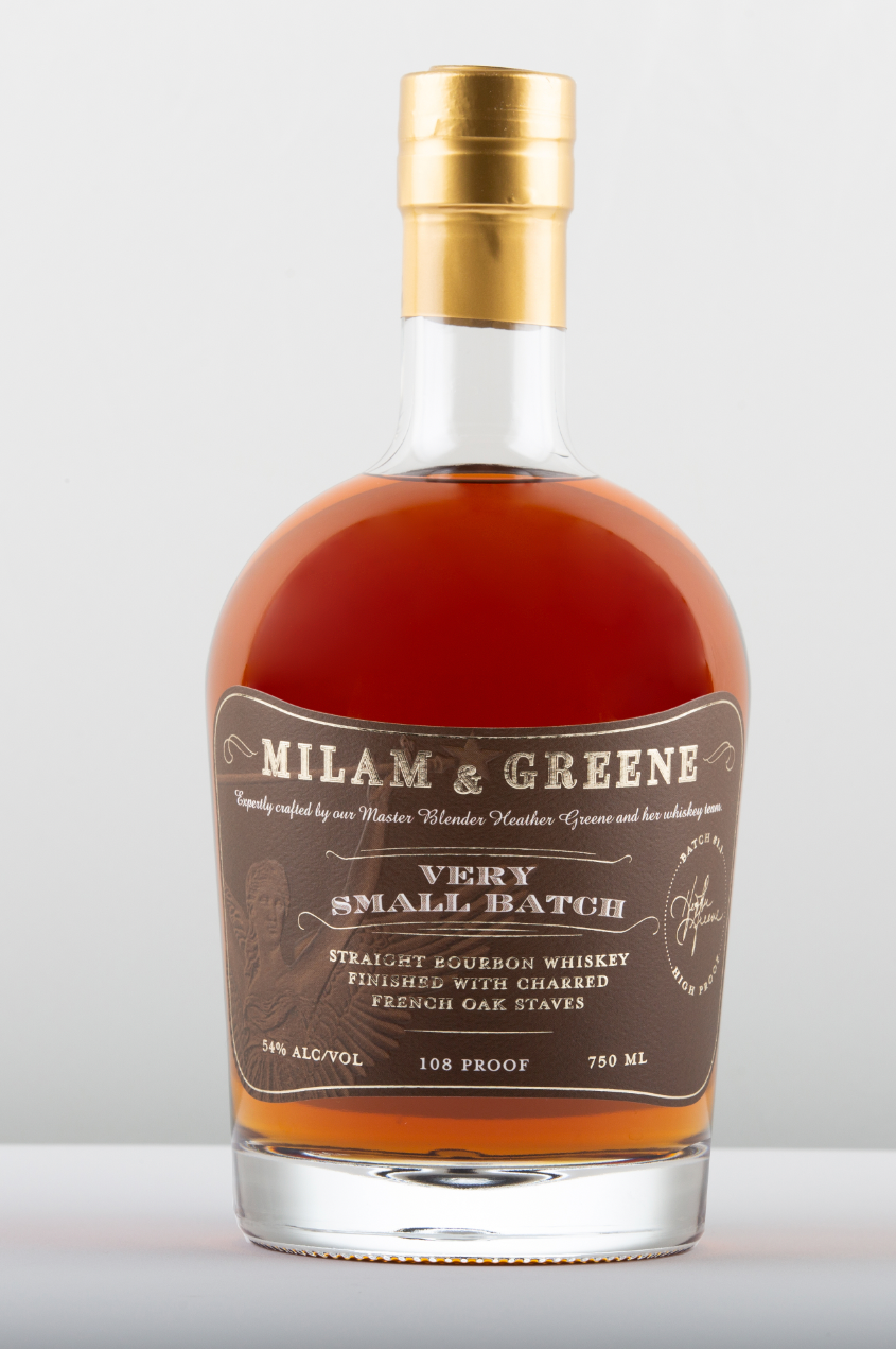 bottle of bourbon with a brown label reading very small batch straight bourbon whiskey finishing with charred french oak staves 108 proof