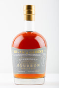 Bourbon bottle with grey label and gold lettering