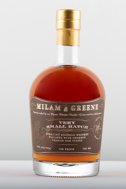 bottle of bourbon with a brown label reading very small batch straight bourbon whiskey finishing with charred french oak staves 108 proof